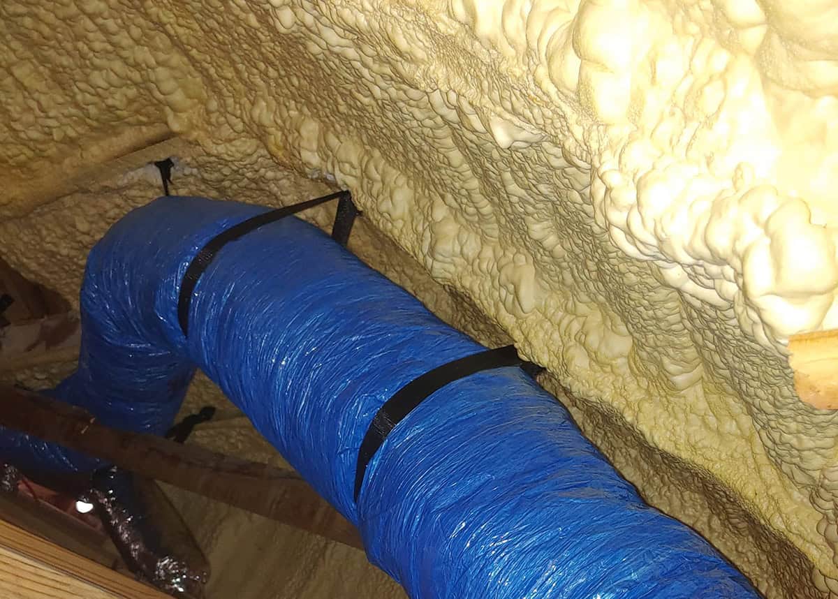 Bolton Heating and Air in Forney apply spray foam in attic