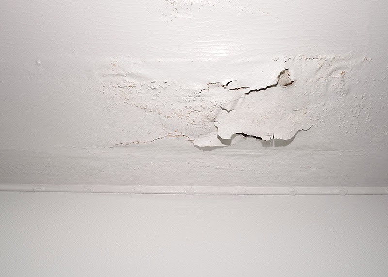 Water damage on ceiling from a leaking AC system